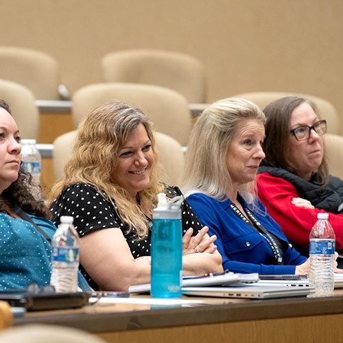 group listening at a meeting during the AmeriVet summit